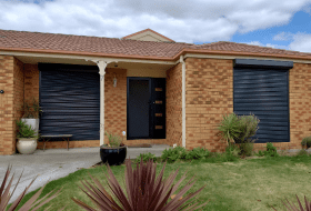 Outdoor roller shutters, brick house